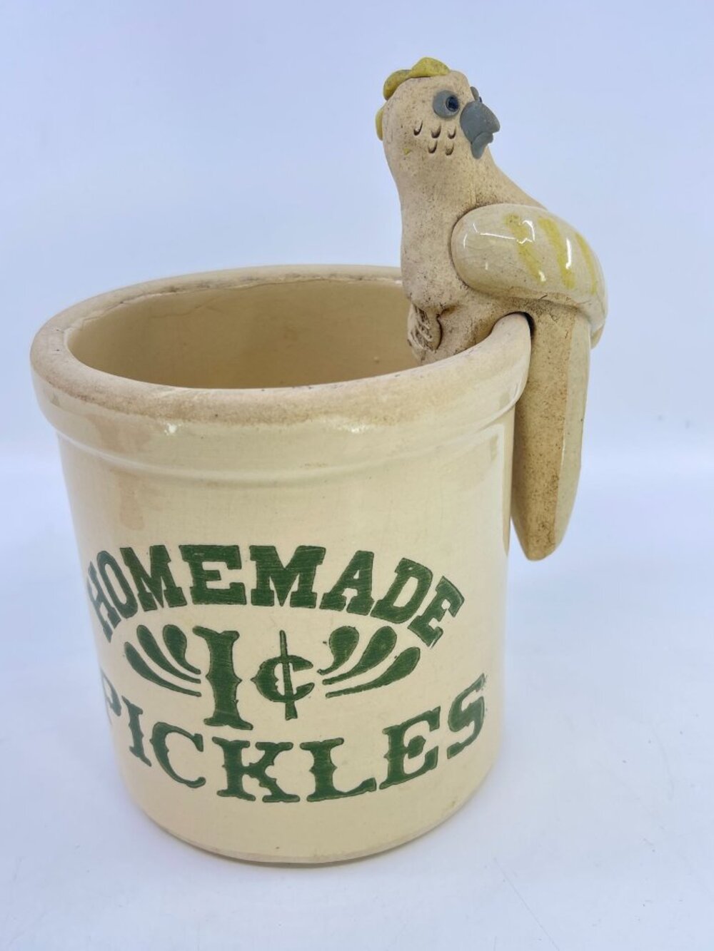 vintage homemade pickles crock with clay bird accent  utensil holder